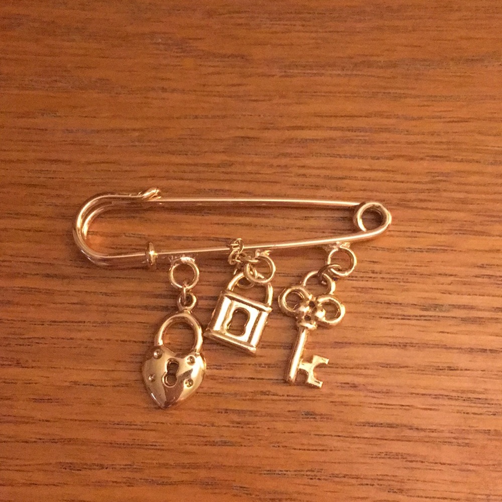 Vintage charm safety pin